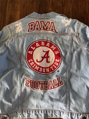 Alabama Crimson Tide women's light-wash denim jacket featuring embroidered